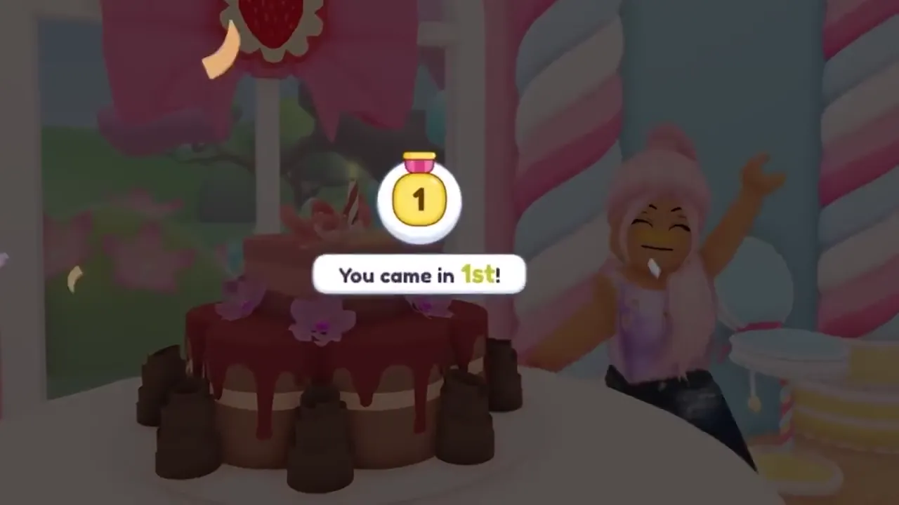 A player beside a chocolate cake with the badge “You came in 1st!”