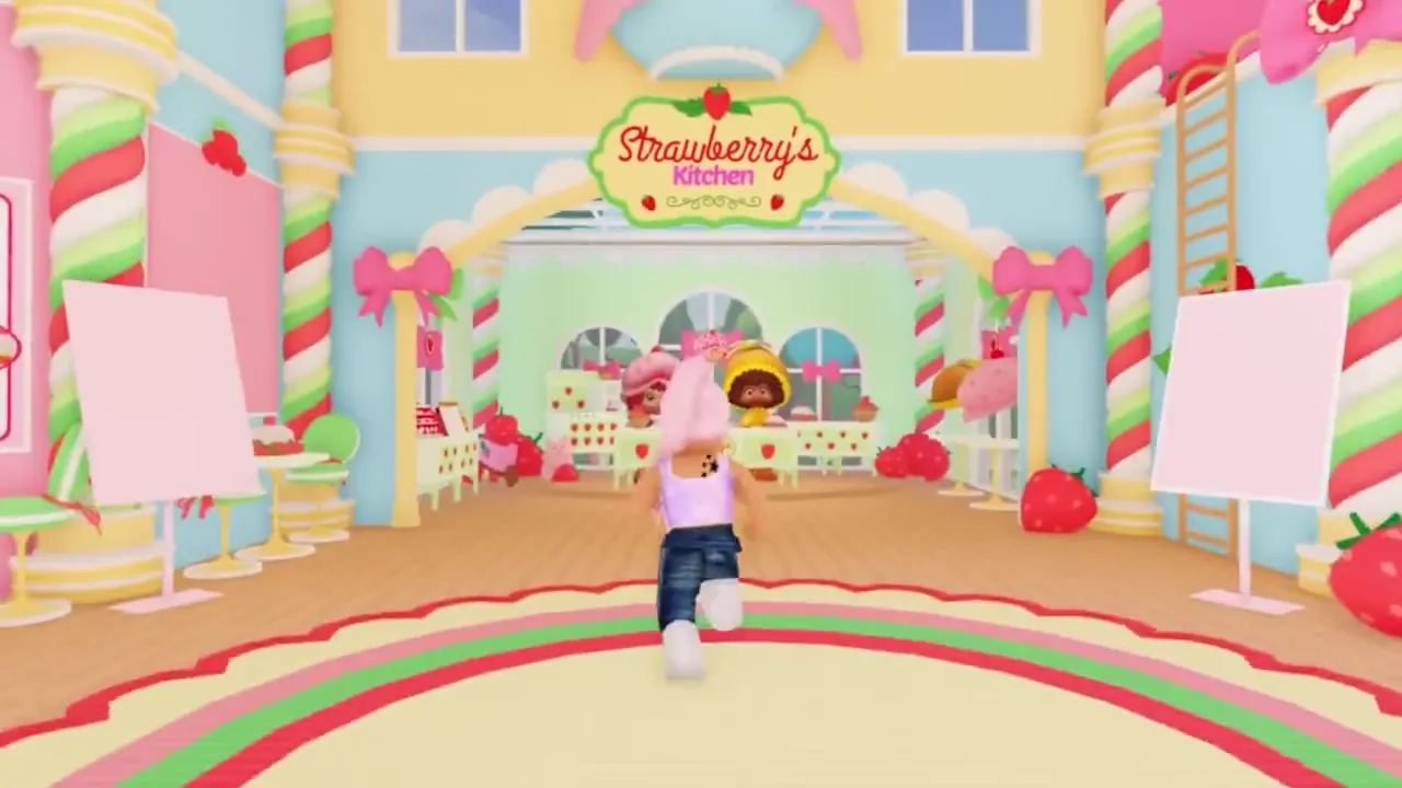 A player runs through the arch into Strawberry’s Kitchen in Cake Off.